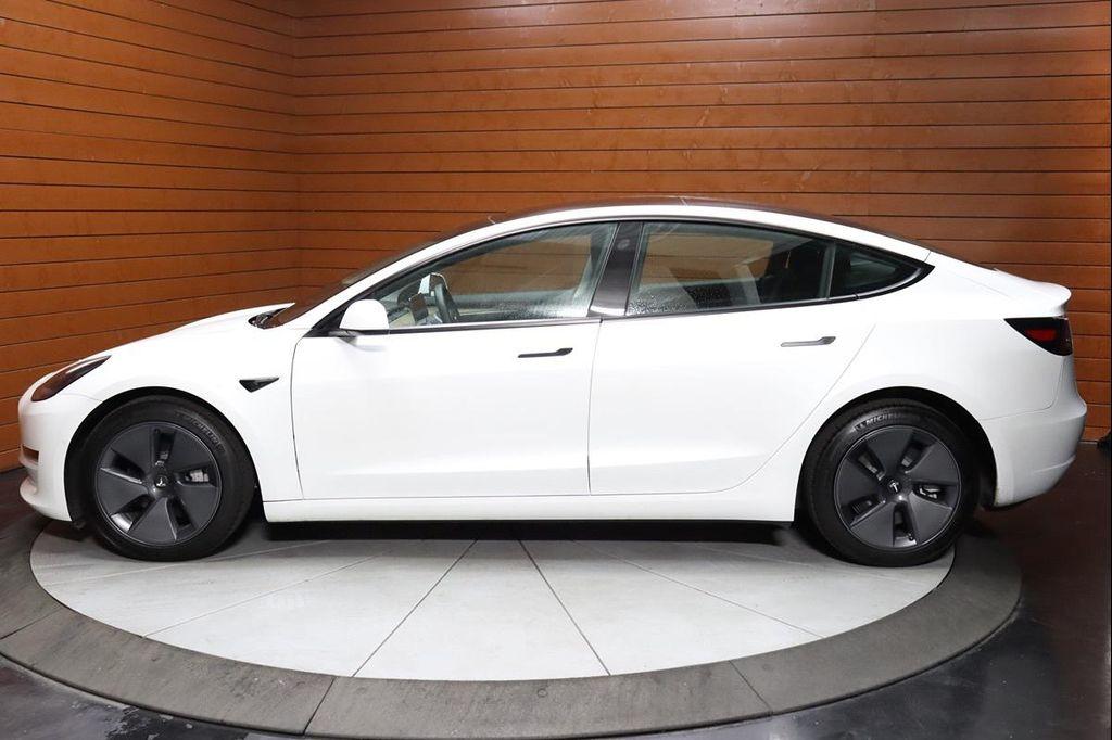 used 2023 Tesla Model 3 car, priced at $20,990
