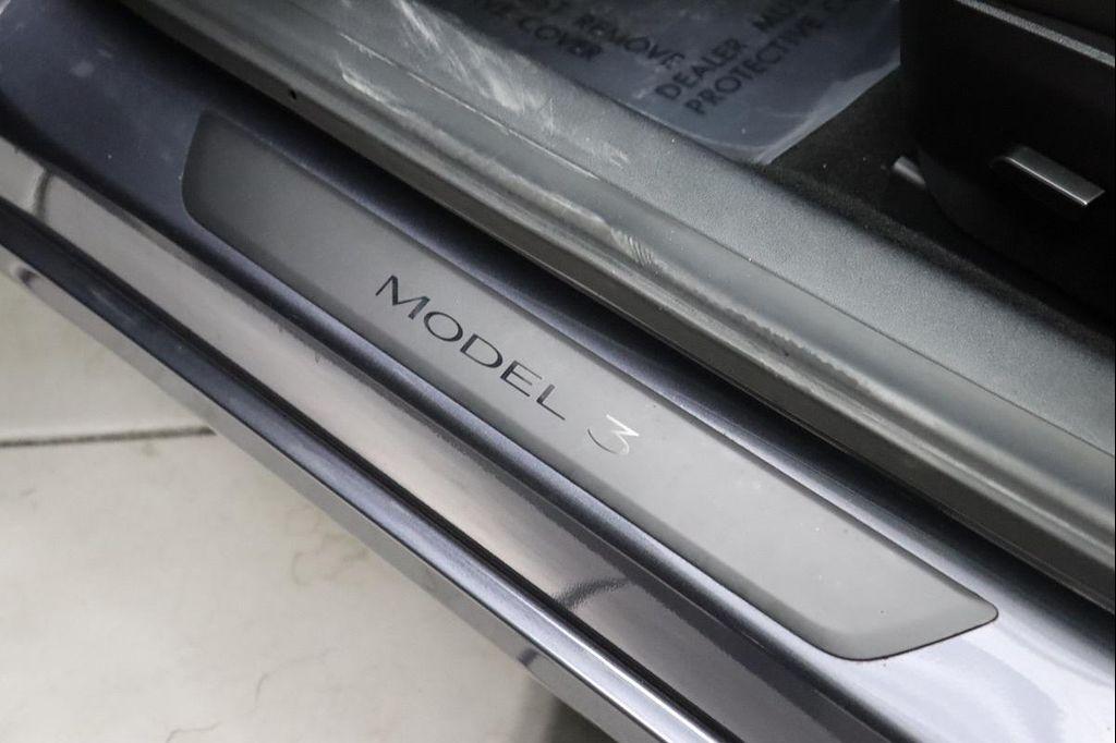 used 2022 Tesla Model 3 car, priced at $25,390