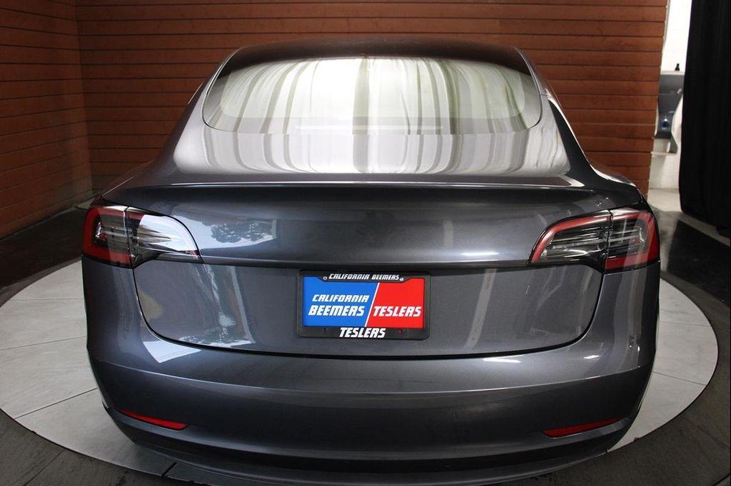 used 2023 Tesla Model 3 car, priced at $22,490