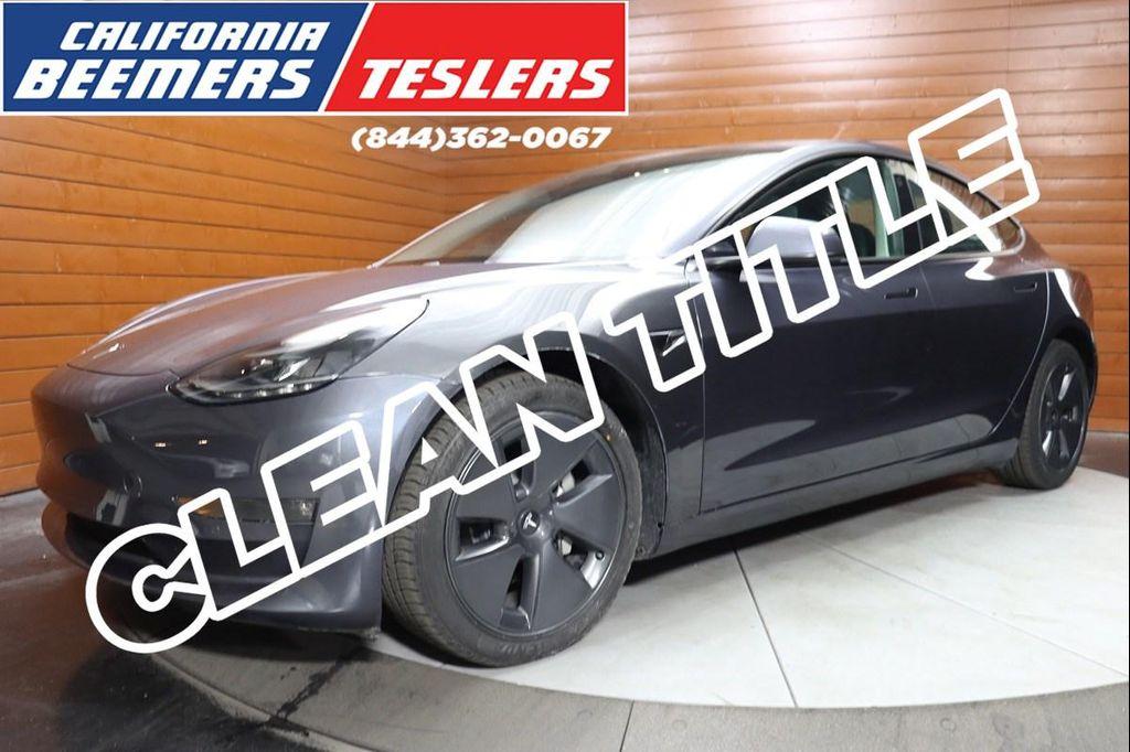 used 2023 Tesla Model 3 car, priced at $22,490