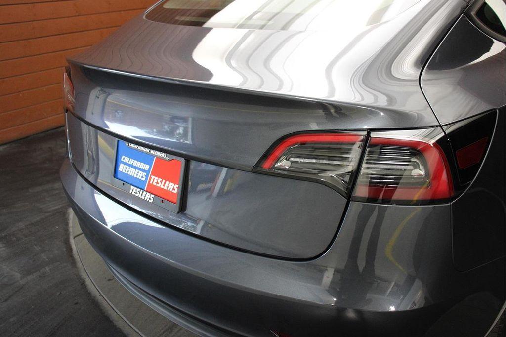 used 2023 Tesla Model 3 car, priced at $22,490