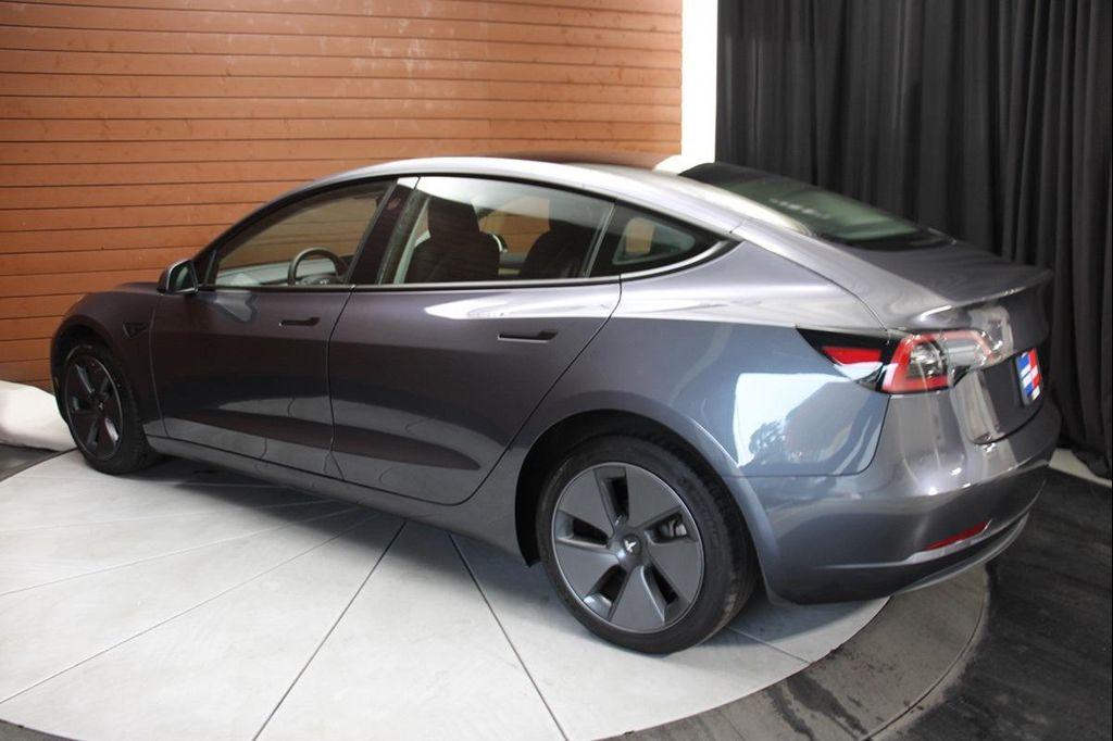 used 2023 Tesla Model 3 car, priced at $22,490
