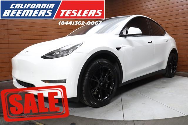 used 2023 Tesla Model Y car, priced at $32,490