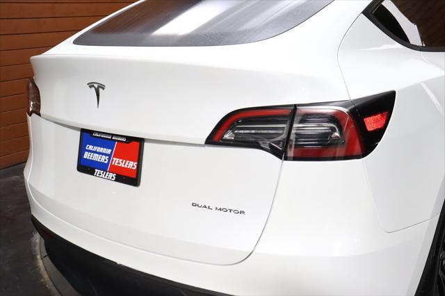 used 2023 Tesla Model Y car, priced at $32,490