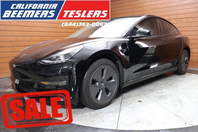 used 2022 Tesla Model 3 car, priced at $26,540