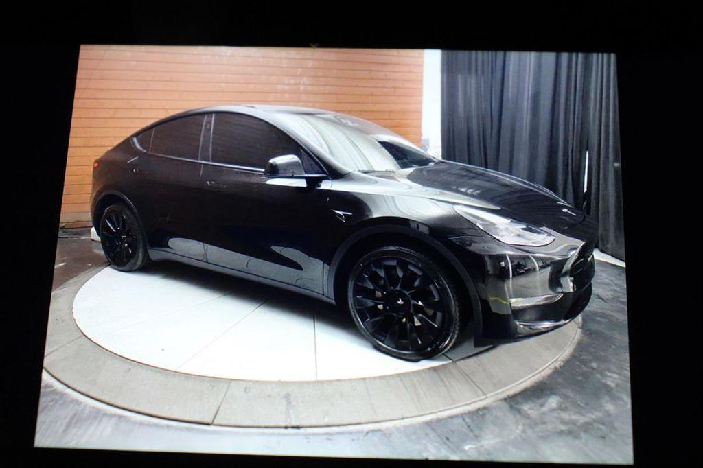 used 2023 Tesla Model Y car, priced at $28,499