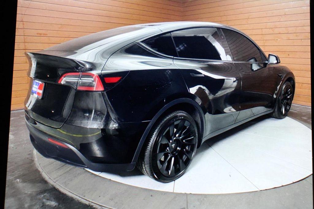 used 2023 Tesla Model Y car, priced at $28,499