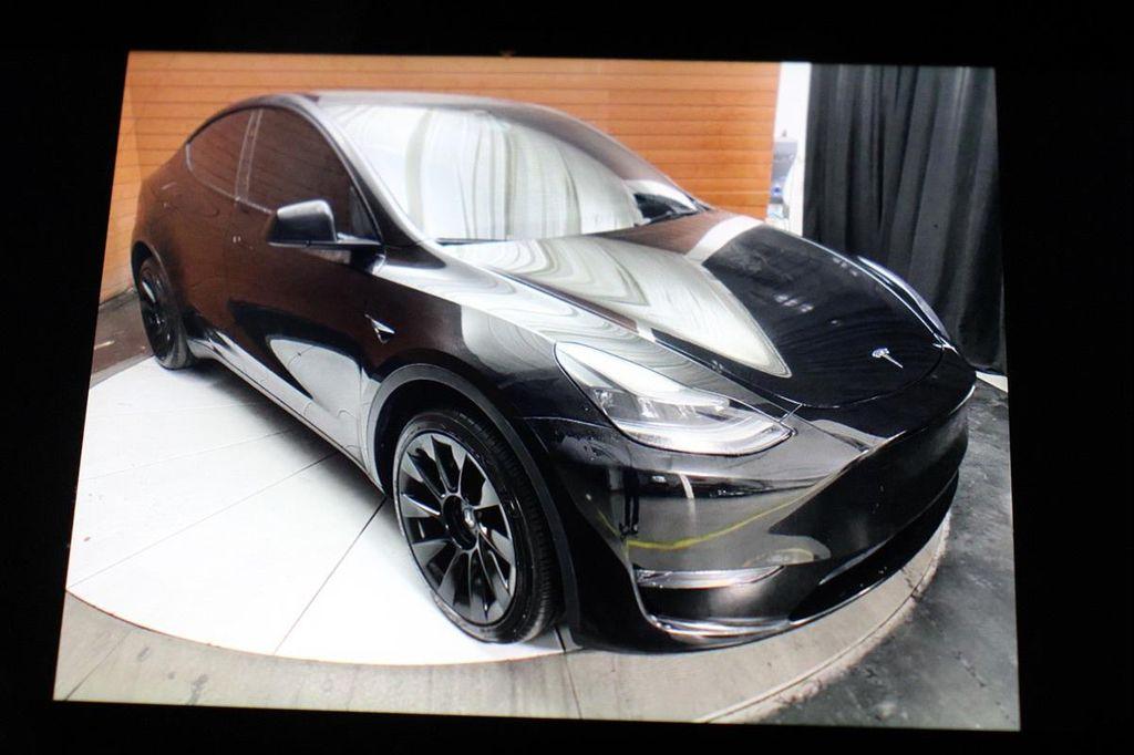 used 2023 Tesla Model Y car, priced at $28,499