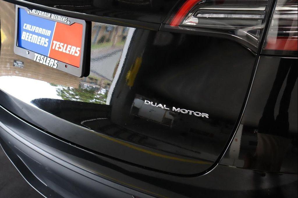 used 2023 Tesla Model Y car, priced at $28,499