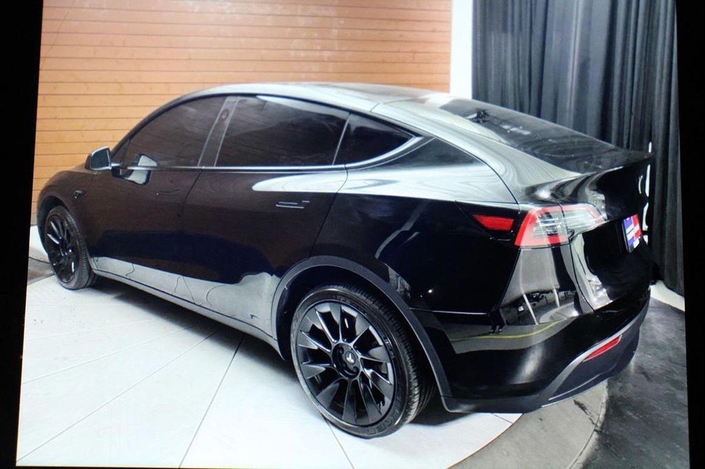 used 2023 Tesla Model Y car, priced at $28,499