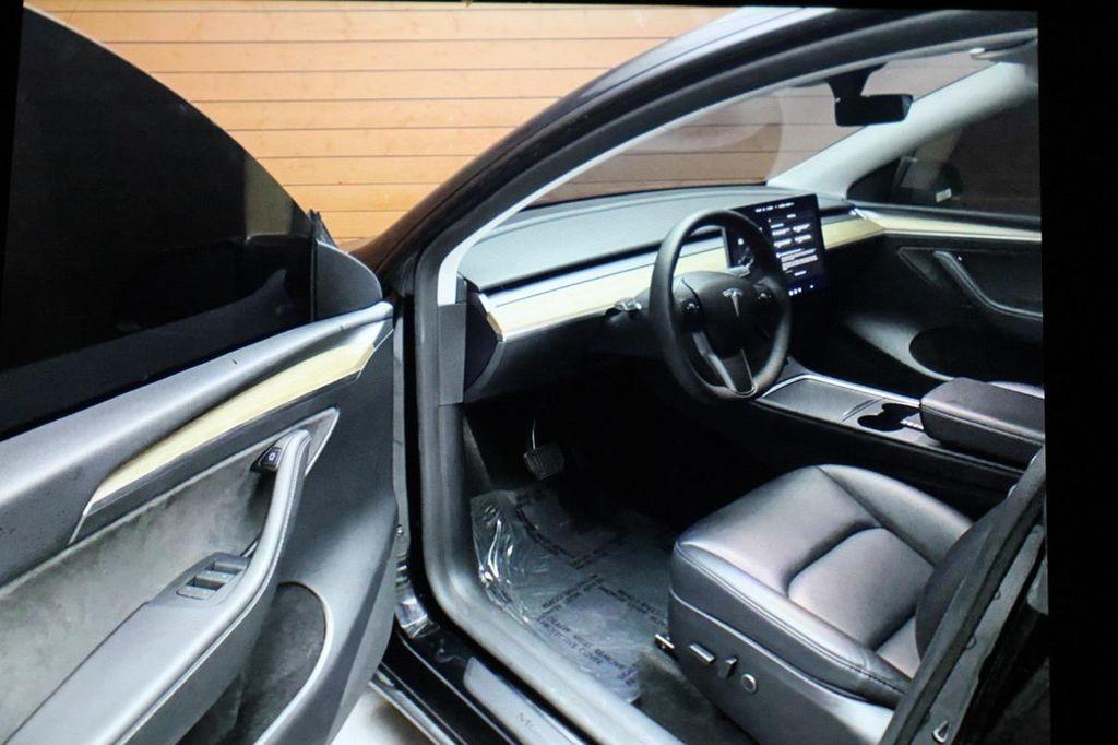 used 2023 Tesla Model Y car, priced at $28,499