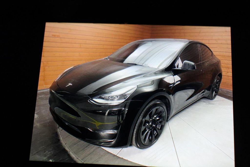 used 2023 Tesla Model Y car, priced at $28,499