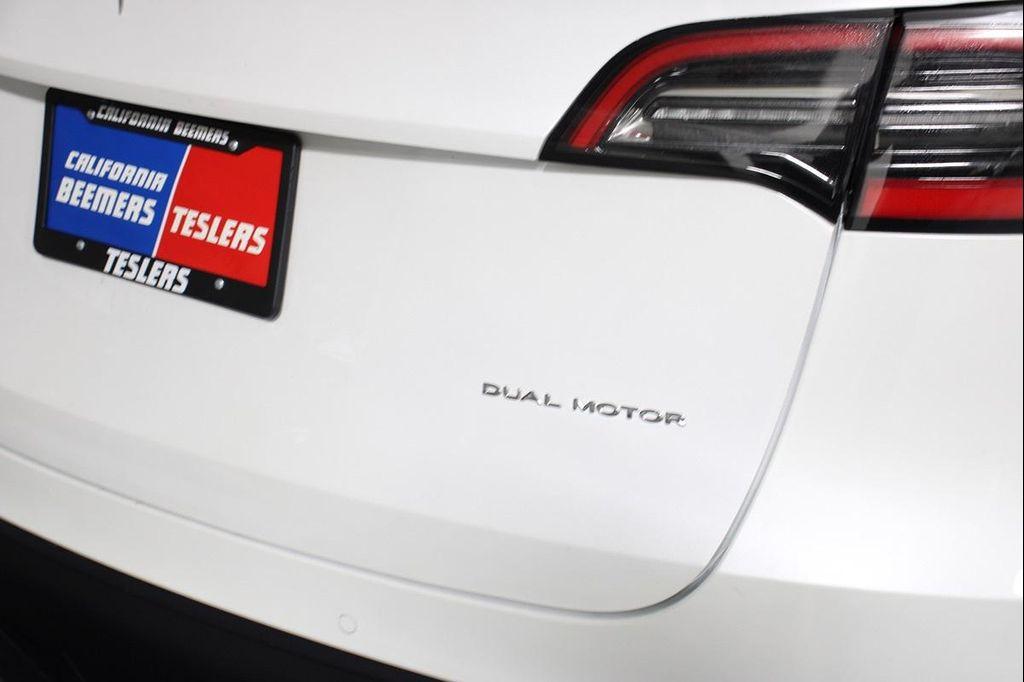 used 2021 Tesla Model Y car, priced at $25,590