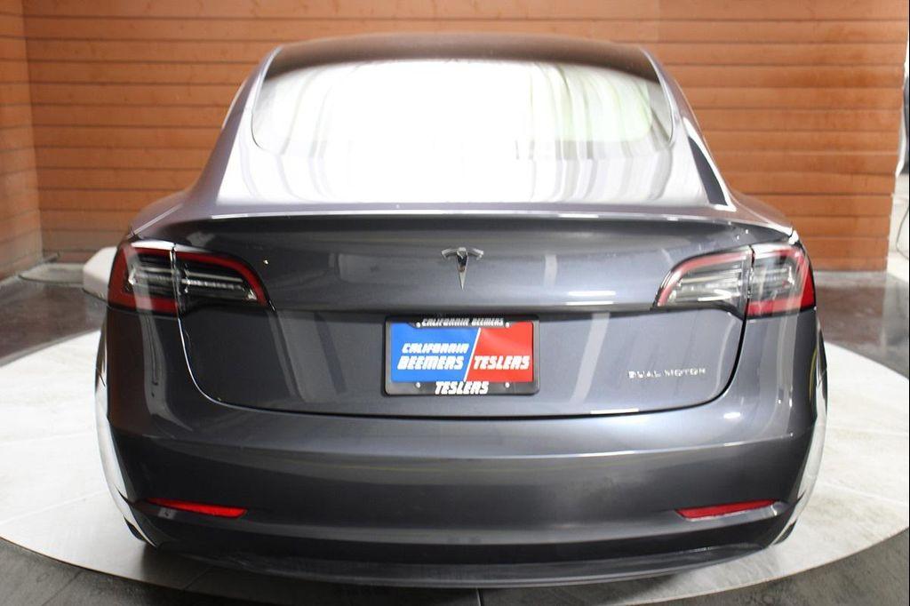used 2023 Tesla Model 3 car, priced at $26,990