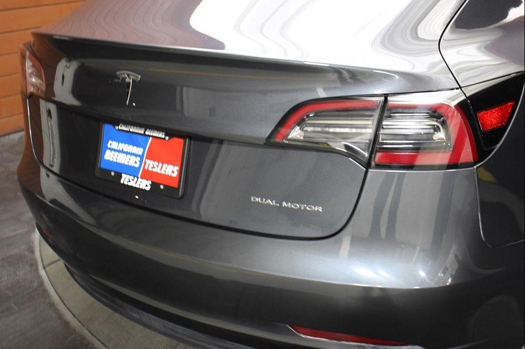 used 2023 Tesla Model 3 car, priced at $26,990
