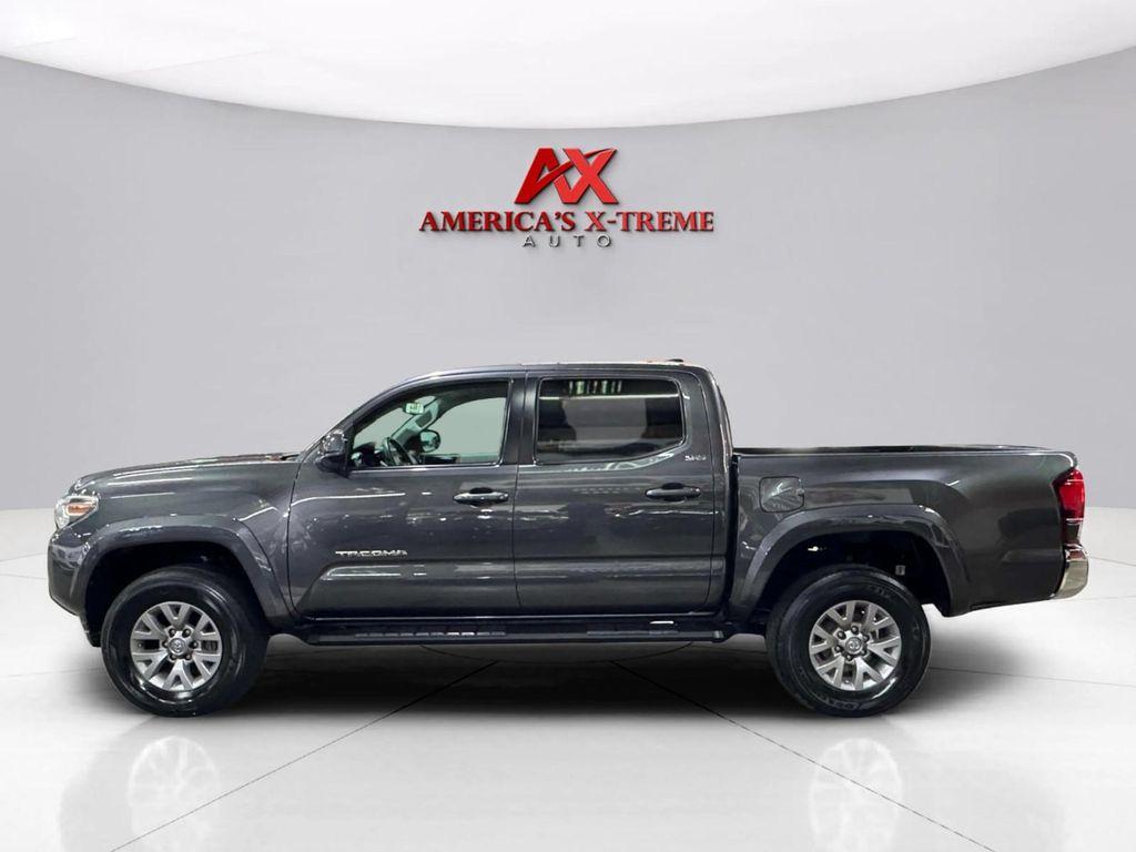 used 2019 Toyota Tacoma car, priced at $25,046