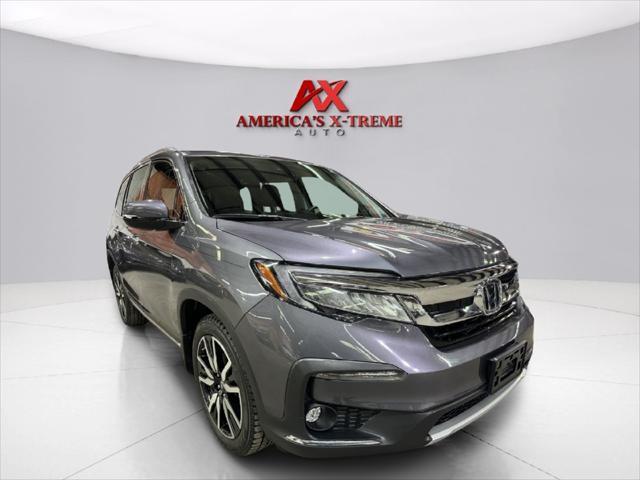 used 2021 Honda Pilot car, priced at $26,952