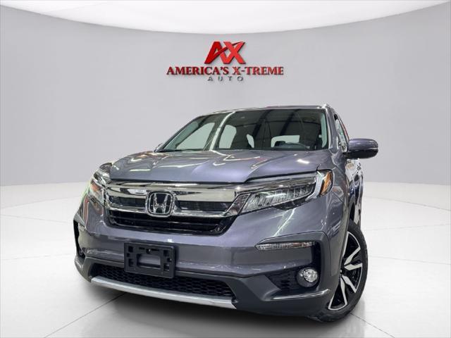 used 2021 Honda Pilot car, priced at $26,952