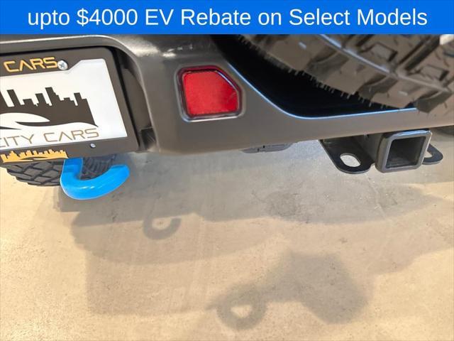 used 2023 Jeep Wrangler 4xe car, priced at $26,799