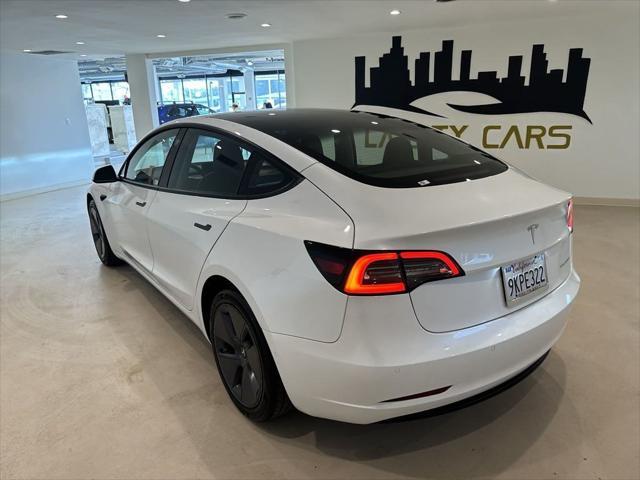 used 2022 Tesla Model 3 car, priced at $26,999