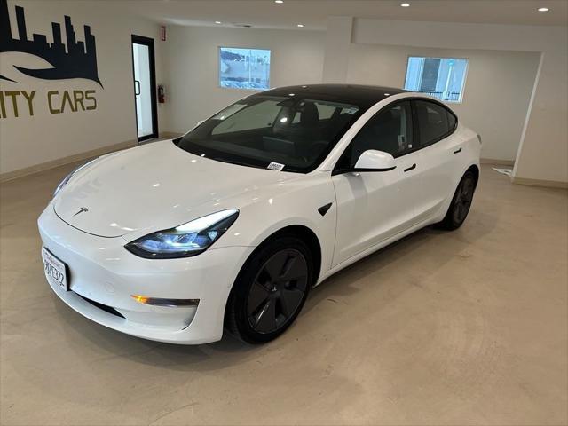 used 2022 Tesla Model 3 car, priced at $26,999