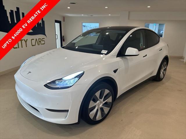 used 2020 Tesla Model Y car, priced at $27,999