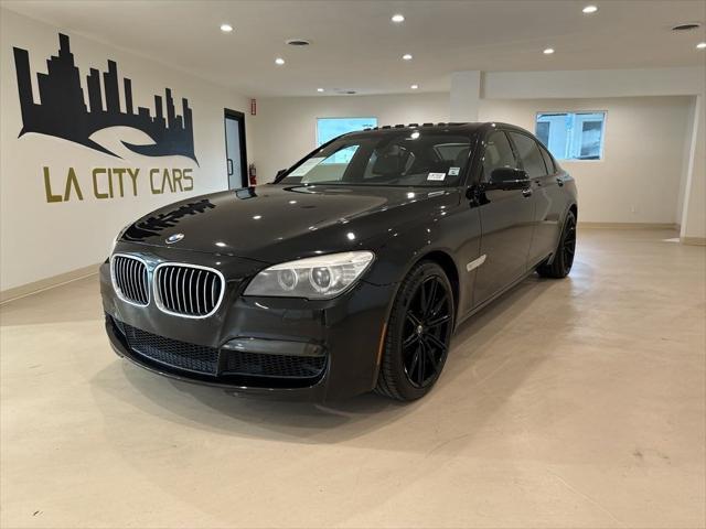 used 2015 BMW 740 car, priced at $16,899