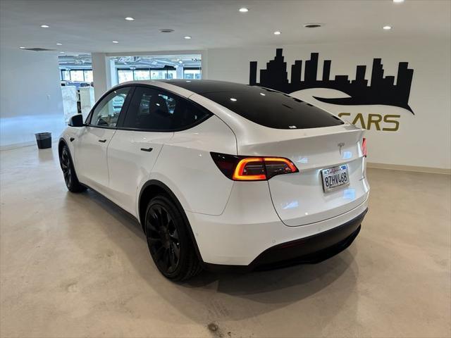 used 2022 Tesla Model Y car, priced at $29,999