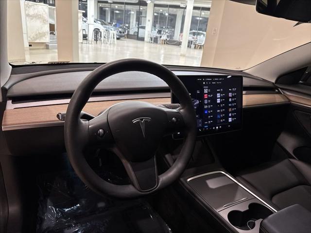 used 2022 Tesla Model 3 car, priced at $25,999