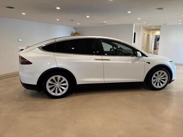 used 2018 Tesla Model X car, priced at $28,999