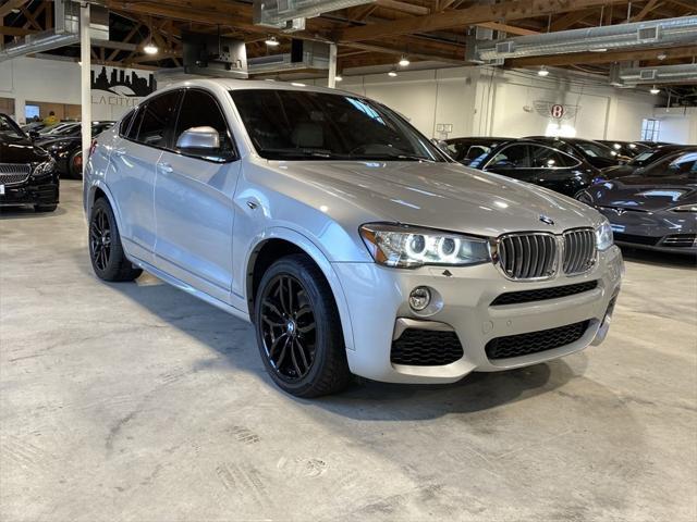 used 2018 BMW X4 car, priced at $22,899