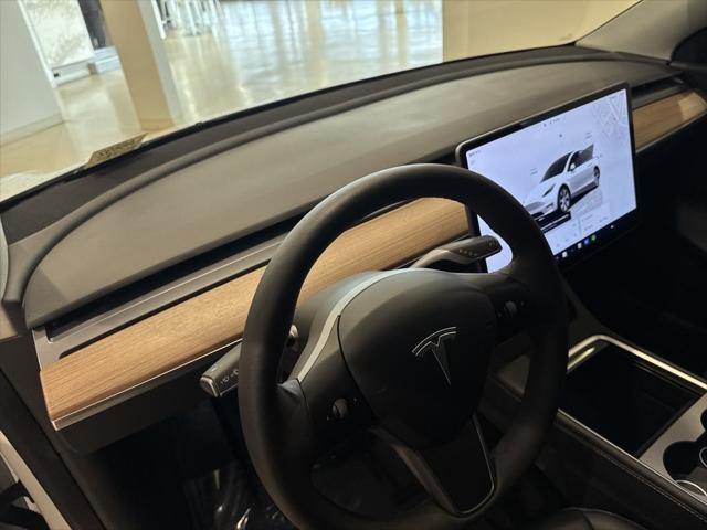 used 2022 Tesla Model Y car, priced at $29,299