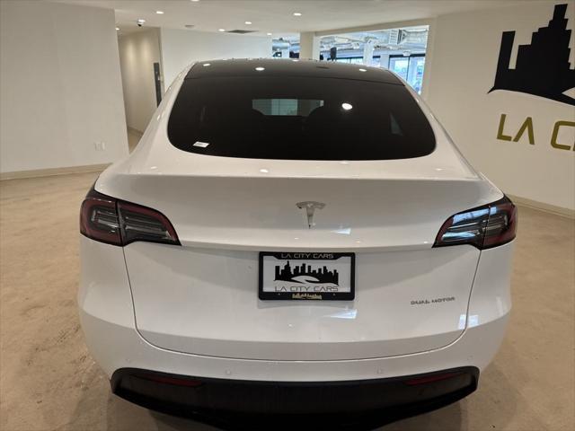 used 2022 Tesla Model Y car, priced at $29,299