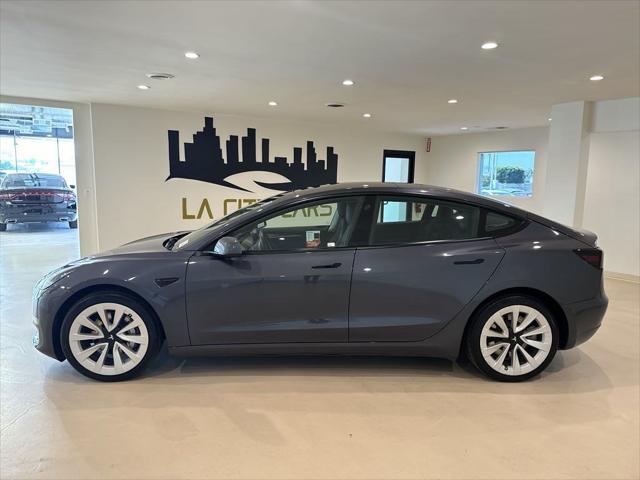 used 2022 Tesla Model 3 car, priced at $25,999