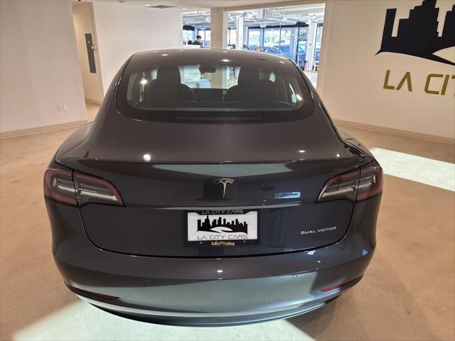 used 2022 Tesla Model 3 car, priced at $25,999