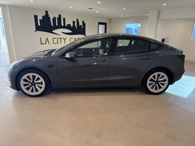 used 2022 Tesla Model 3 car, priced at $25,999