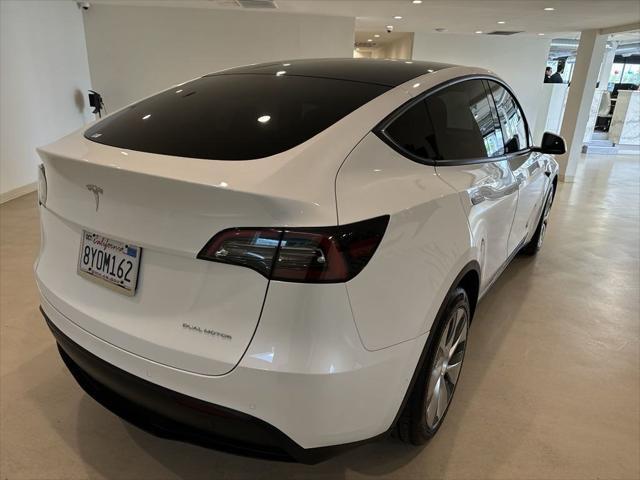 used 2021 Tesla Model Y car, priced at $28,999