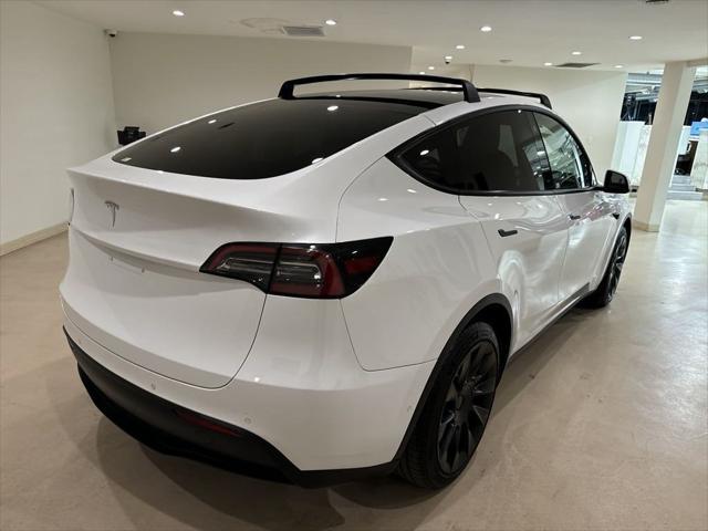 used 2021 Tesla Model Y car, priced at $27,999