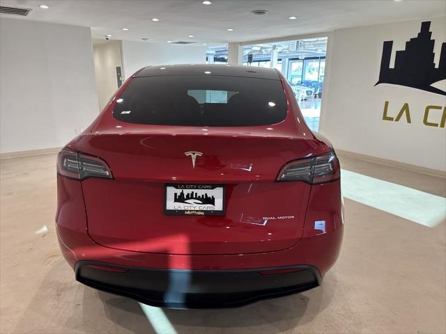 used 2022 Tesla Model Y car, priced at $29,999