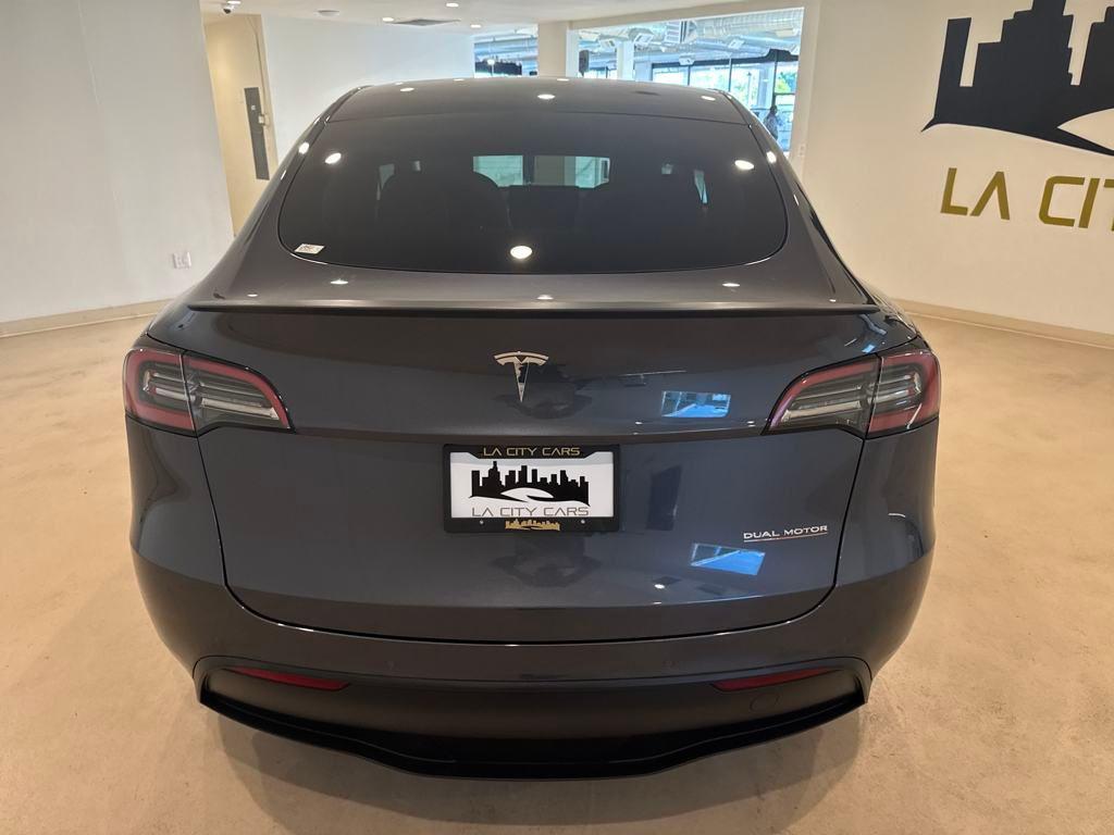 used 2022 Tesla Model Y car, priced at $27,899