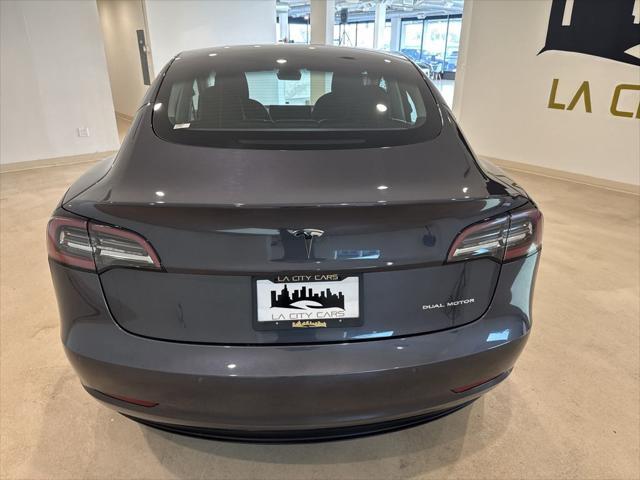 used 2022 Tesla Model 3 car, priced at $26,999