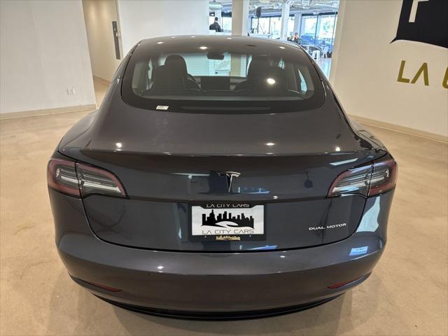 used 2022 Tesla Model 3 car, priced at $26,999