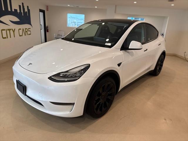 used 2023 Tesla Model Y car, priced at $28,199