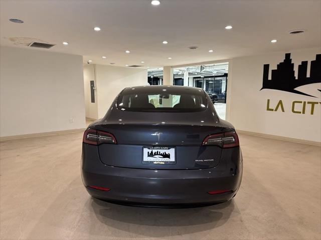 used 2022 Tesla Model 3 car, priced at $26,999