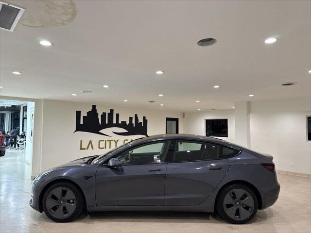 used 2022 Tesla Model 3 car, priced at $26,999