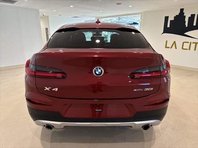 used 2021 BMW X4 car, priced at $31,999