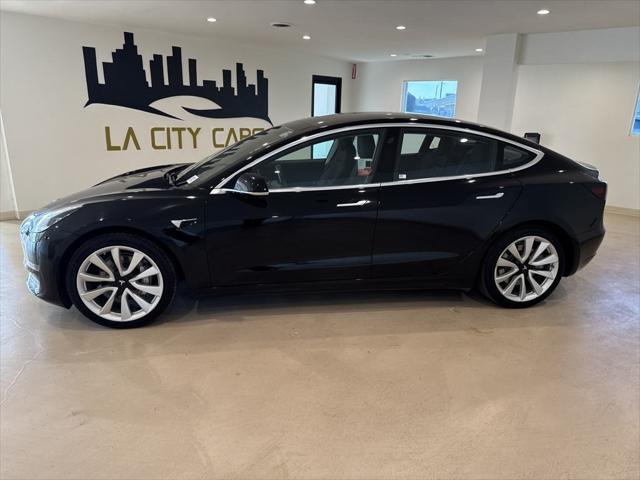 used 2018 Tesla Model 3 car, priced at $20,099