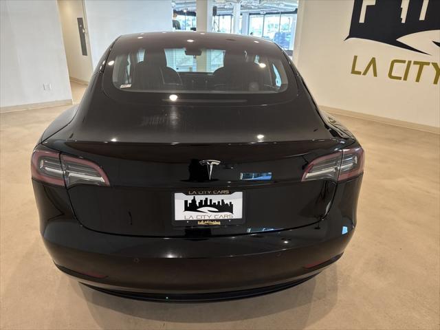 used 2018 Tesla Model 3 car, priced at $20,099