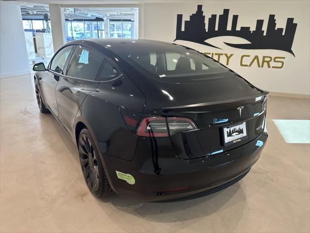 used 2022 Tesla Model 3 car, priced at $28,999