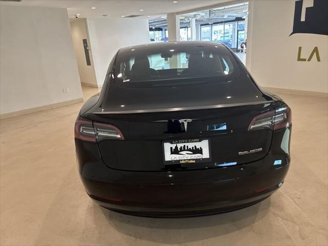 used 2022 Tesla Model 3 car, priced at $28,999